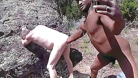 Black cock in an outdoor setting fisting a black girl