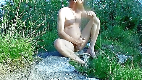 Sexy lady takes off her clothes and dances outdoors